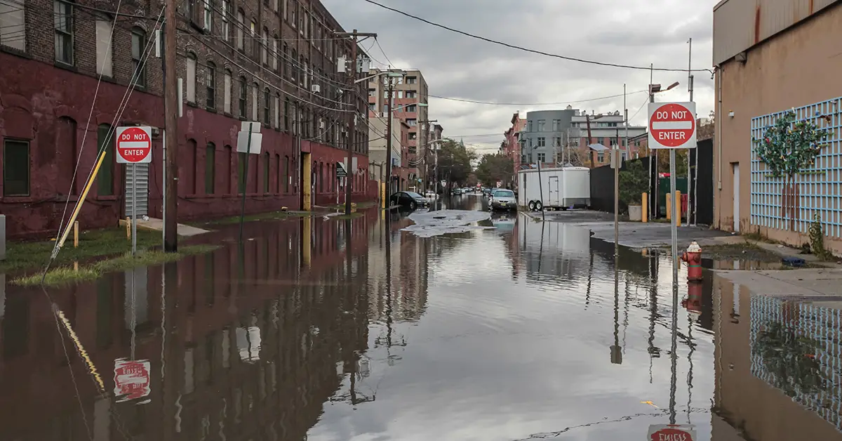 Photo of a flooded city street after a hurricane. Photo by Adobe Stock.