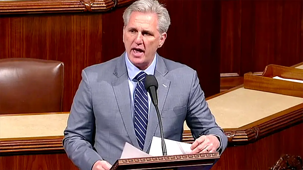 Photo of Speaker of the U.S. House of Representatives, Kevin McCarthy, standing and talking at a podium.