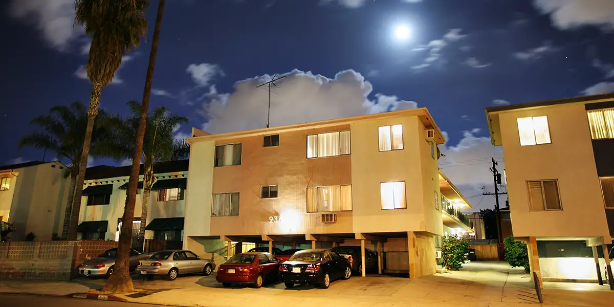 Photo of apartment buildings in the City of Los Angeles, California at night.